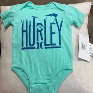 Teal Hurley boys onesie. Size 0-3M. NWT